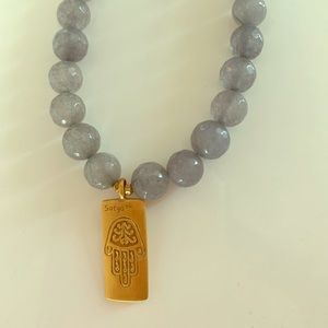 Athleta Hamsa necklace